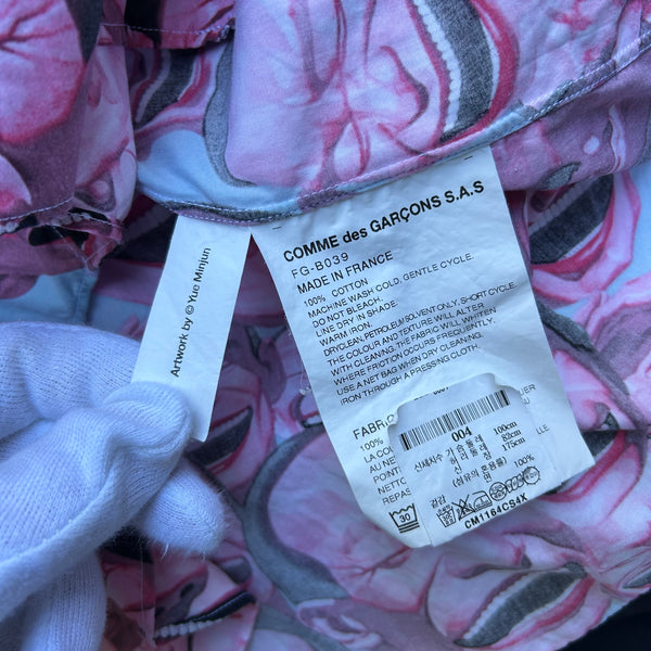 Comme des Garcons Shirt x Yue Minjun Laughing Man Pink Shirt S/S21 Tag