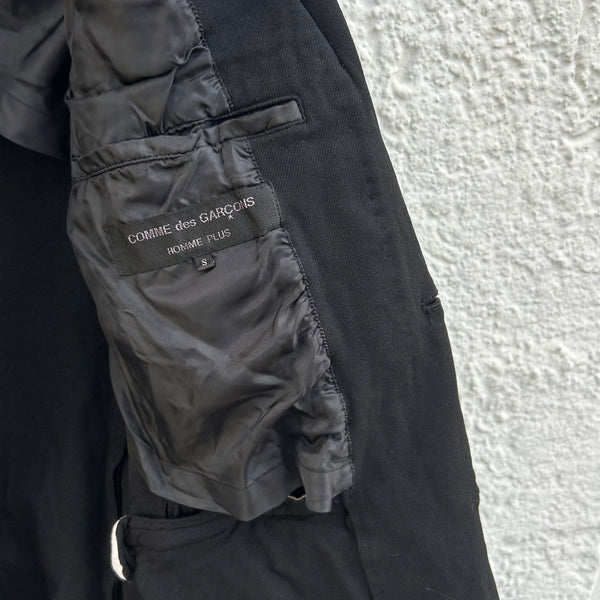 Close up view of Comme des Garcons Homme Plus Black Patchwork Blazer Jacket F/W05 Inside